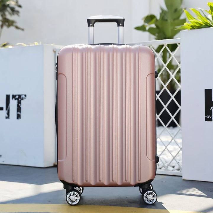 Hard shell suitcase with 360-degree wheel system and integrated safety feature Kalsten
