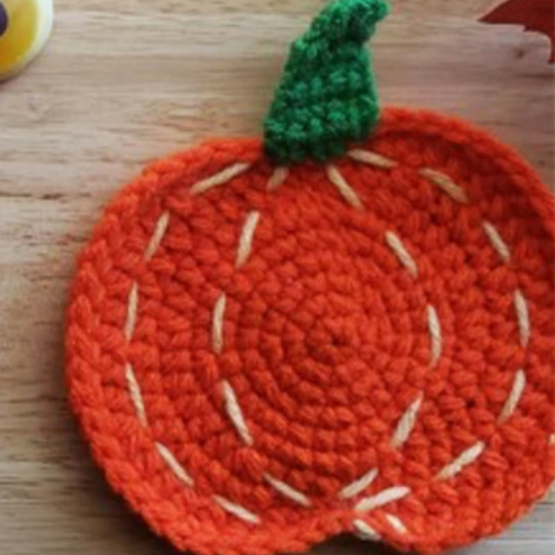 Hand-crocheted pumpkin pot holder and table mat made of cotton yarn
