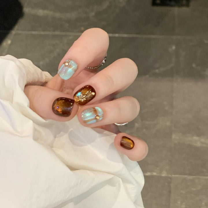 Artificial nail art tips with shimmer and glitter Kalsten