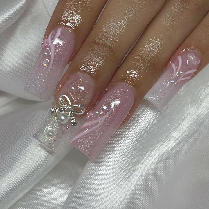 Artistic acrylic nails with elegant jewelry accents Kalsten