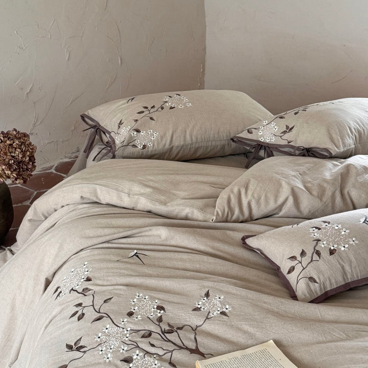 Embroidered bedding set made of linen look with decorative stripes and floral embroidery
