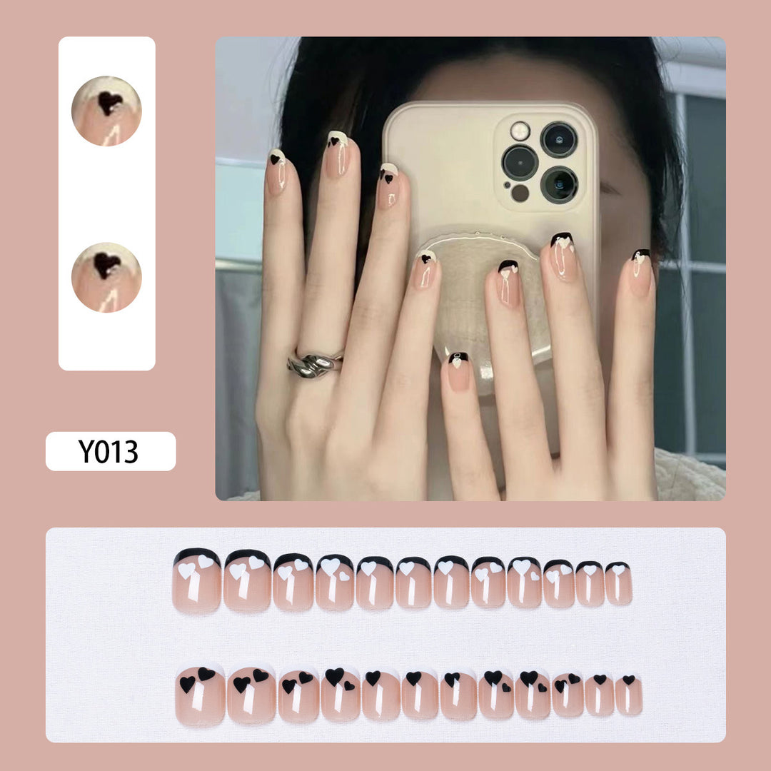 Artistic Press-On Nail Set with Heart and Leaf Designs