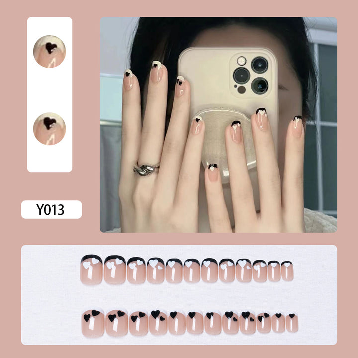 Artistic Press-On Nail Set with Heart and Leaf Designs