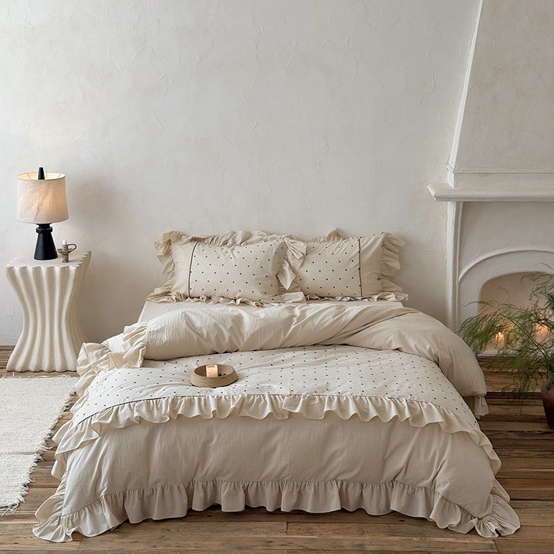 Duvet cover set with ruffle, embroidered dots, and stonewashed cotton finish