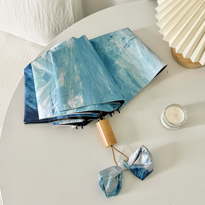 Ladies elegant folding umbrella with unique marble pattern Kalsten