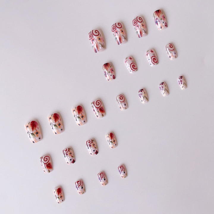 Artificial nail set with striking floral decorations Kalsten