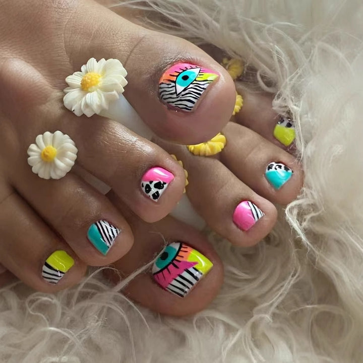 Artificial nail set with vibrant color accents and geometric patterns Kalsten