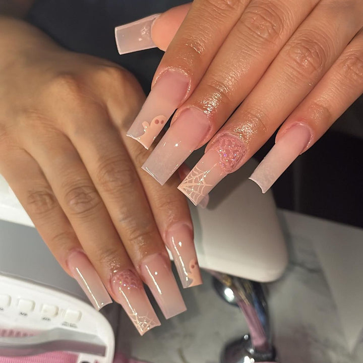 Nail set with filigree spider web design and delicate gradient Kalsten
