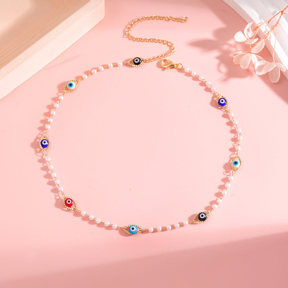 Elegant Pearl and Eye Charm Necklace Kalsten