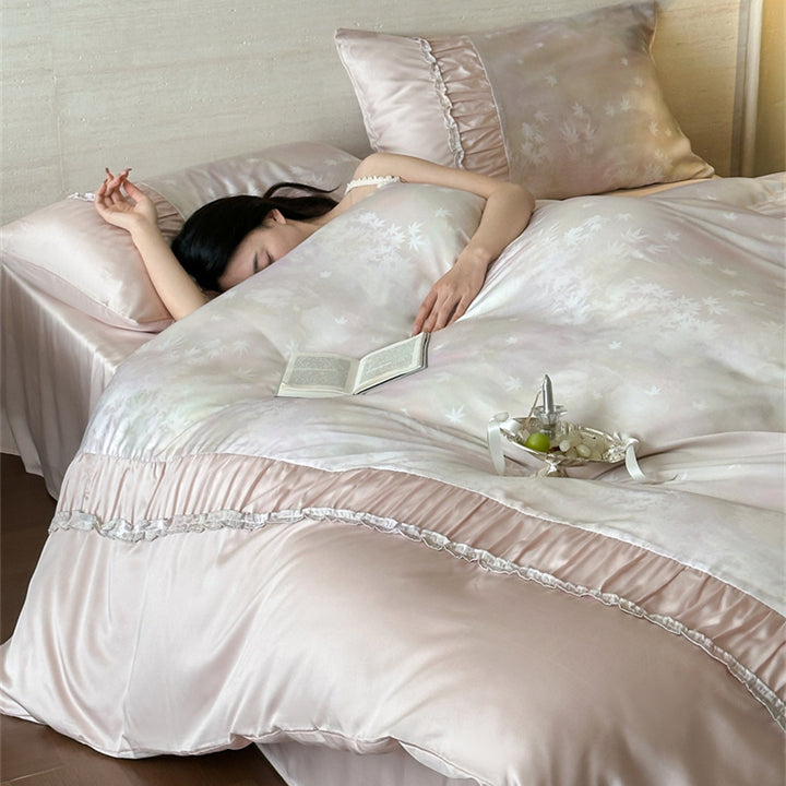 Extra soft satin duvet cover set with voluminous ruffle, subtle watercolor leaf print and concealed closure