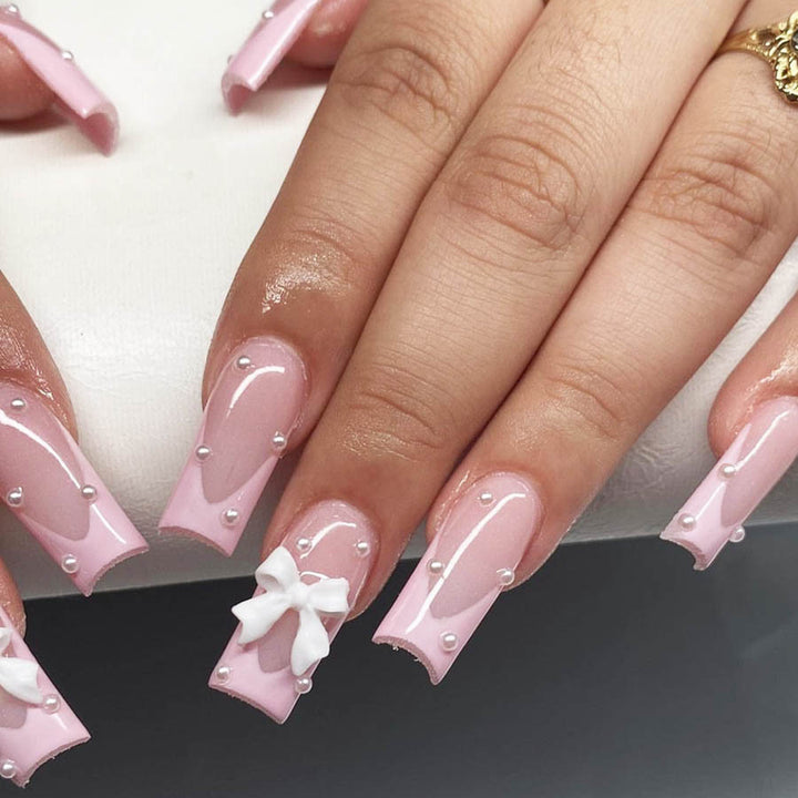 Artificial nail set with romantic bow and pearl embellishments Kalsten