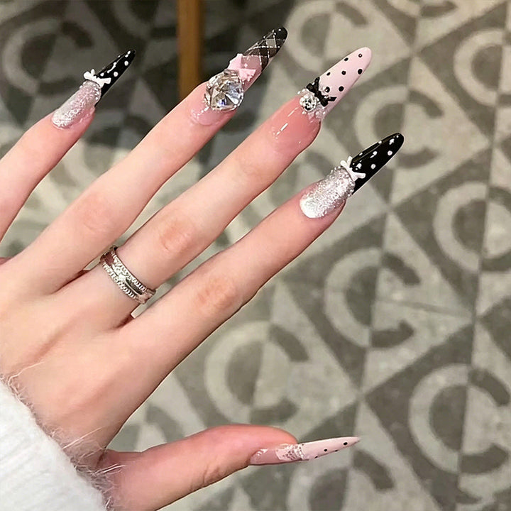 Artificial nail set with glamorous 3D applications and festive design Kalsten
