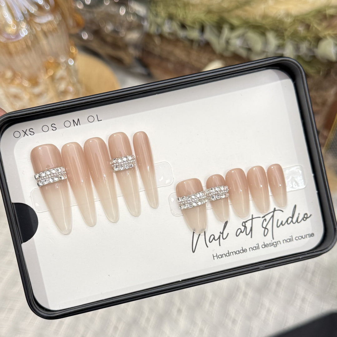 Stiletto Nail Art Tips with Rhinestone Accents Kalsten