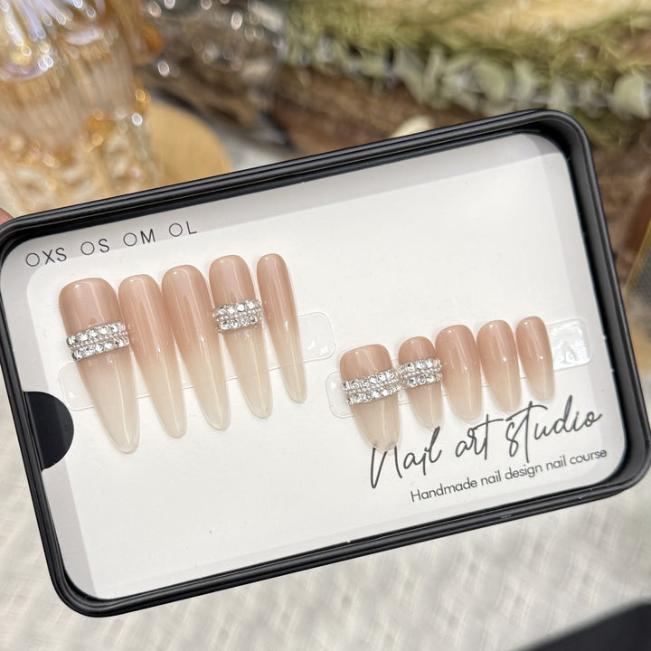 Stiletto Nail Art Tips with Rhinestone Accents Kalsten