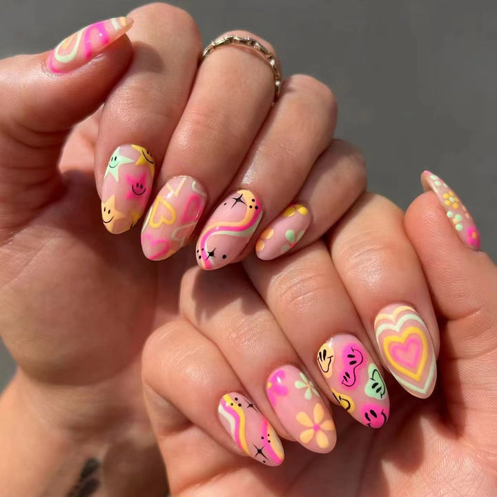 Nail set with playful 3D motifs and colorful designs Kalsten