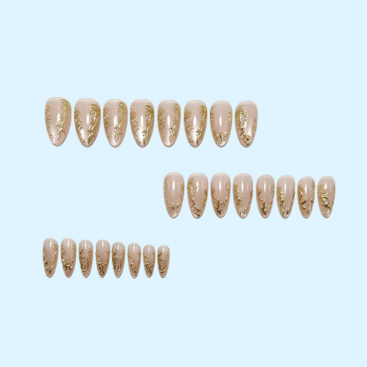 Glamorous artificial nails with delicate gold accents Kalsten