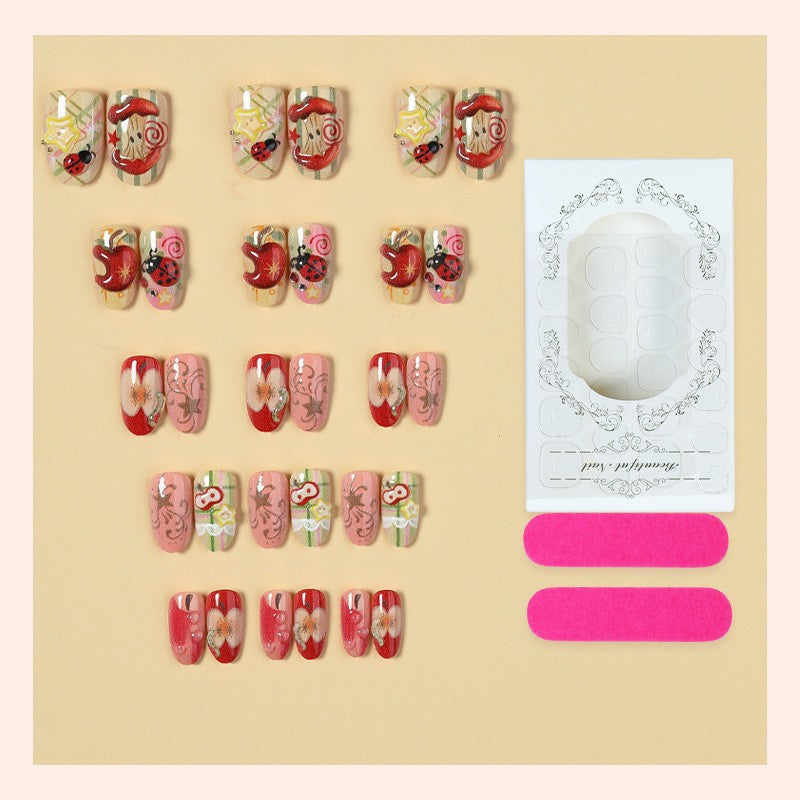 Creative nail art set with playful designs and glitter accents Kalsten