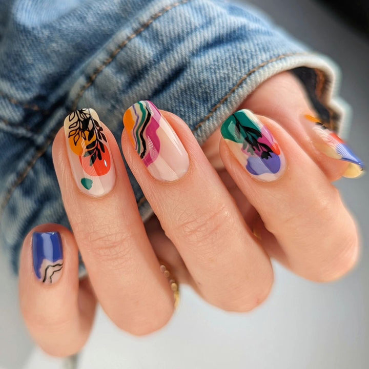 Artistic nail design with colorful accents Kalsten