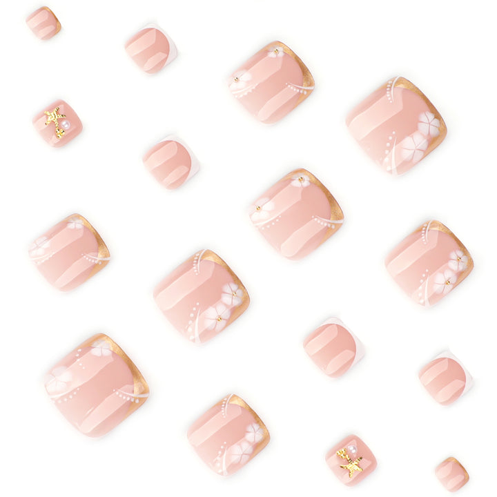 Artful toenail art with delicate flower and glitter accents Kalsten