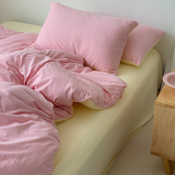 Modern bedding set with reversible duvet cover, fitted sheet and pillowcase made of breathable cotton percale