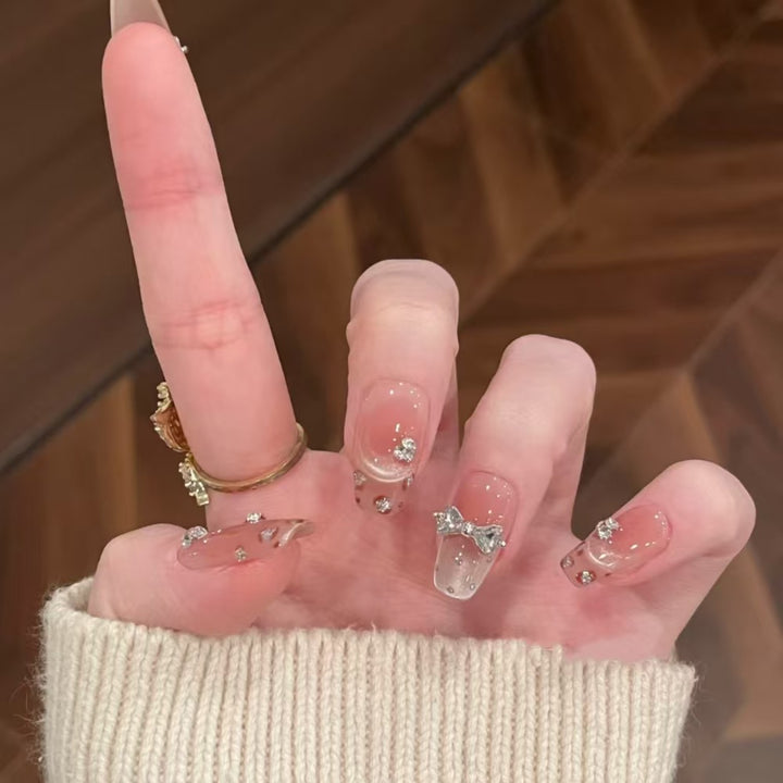 Artistic Press-On Nail Design with Floral Accents Kalsten