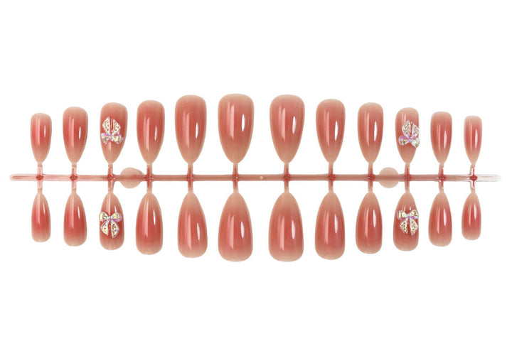 Nail set with elegant ombre effects and sparkling accents Kalsten
