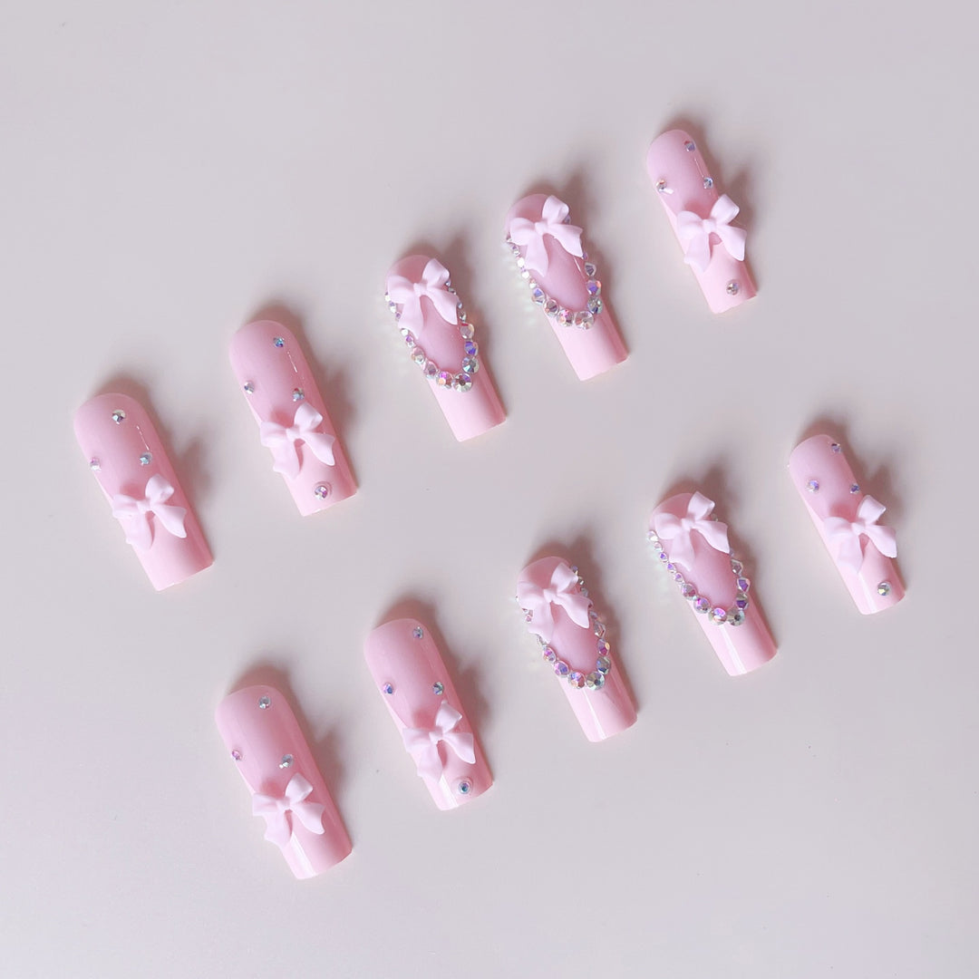 Nail art set with delicate arch decorations and rhinestone details Kalsten