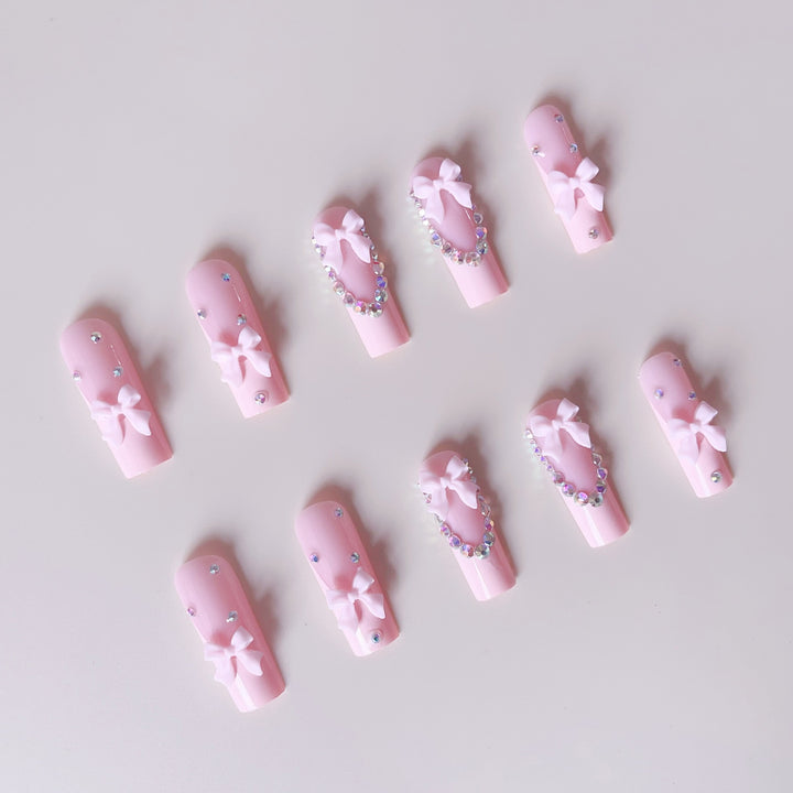 Nail art set with delicate arch decorations and rhinestone details Kalsten