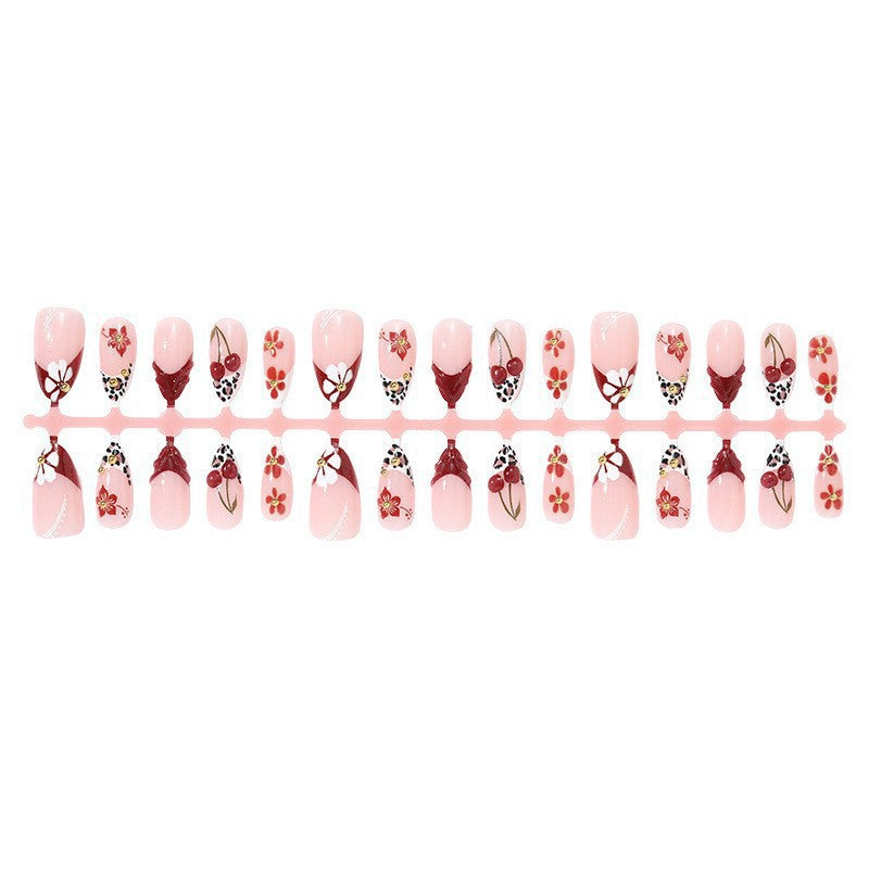 Elegant artificial nails with floral accents and glitter Kalsten