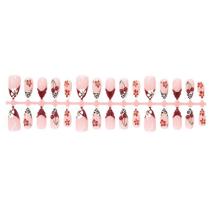 Elegant artificial nails with floral accents and glitter Kalsten