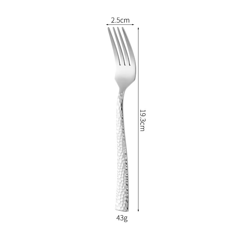 Elegant spoon with unique surface design Kalsten