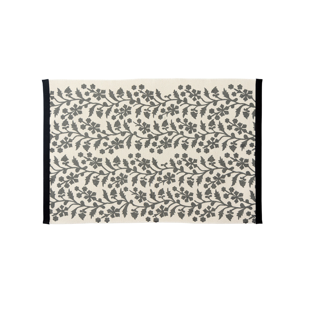 Woven table runner with floral vinyl print look and reinforced overlock stitching Kalsten