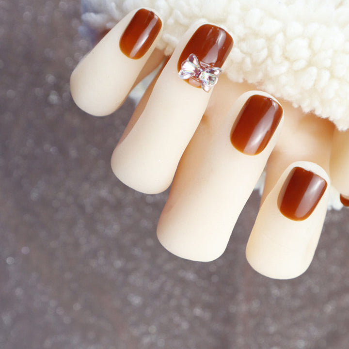 Elegant Press-On Nail Design with Rhinestone Accent