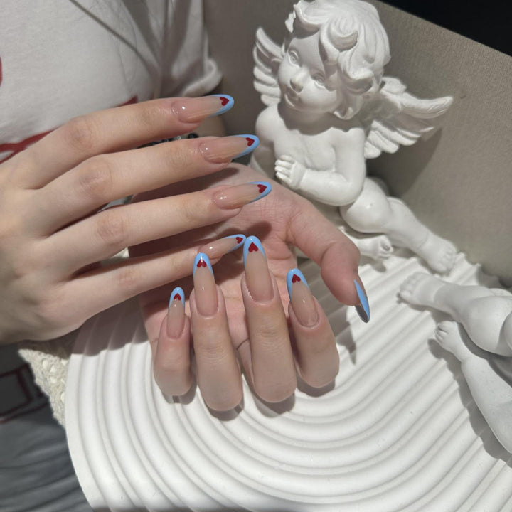 Nail art with heart-shaped design Kalsten