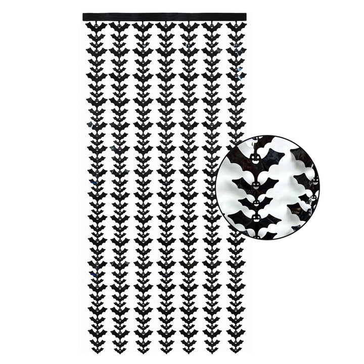 Hanging Halloween curtain made of metallic foil strips with bat silhouettes