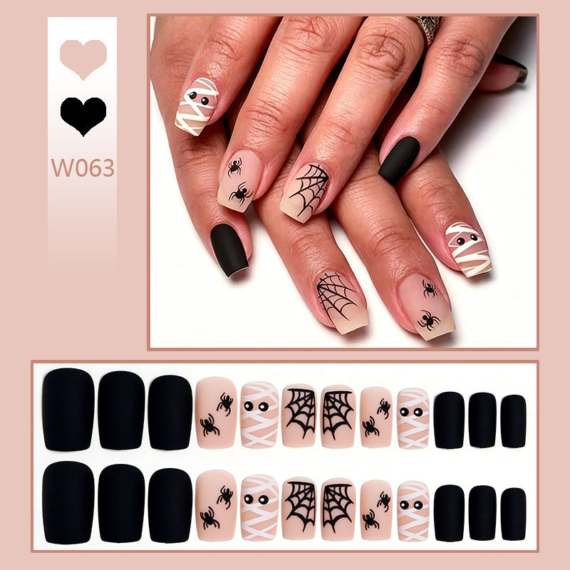 Artificial nail set with creepy Halloween motif and delicate spider designs Kalsten