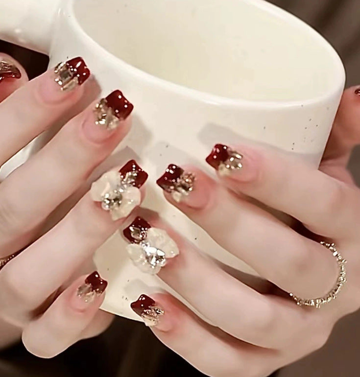 Elegant nail design with pearl embellishment Kalsten