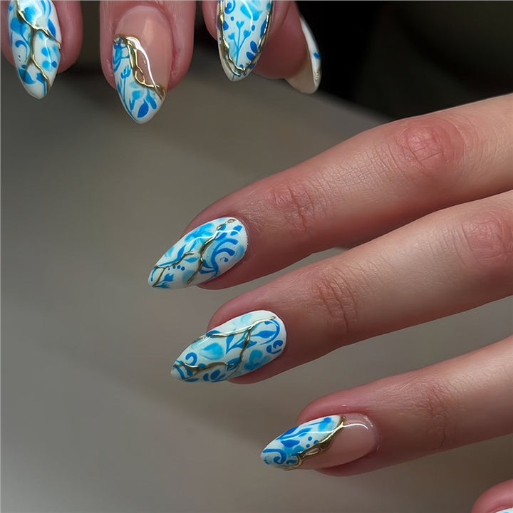 Artistic Floral Press-On Nail Design with Gold Accents Kalsten