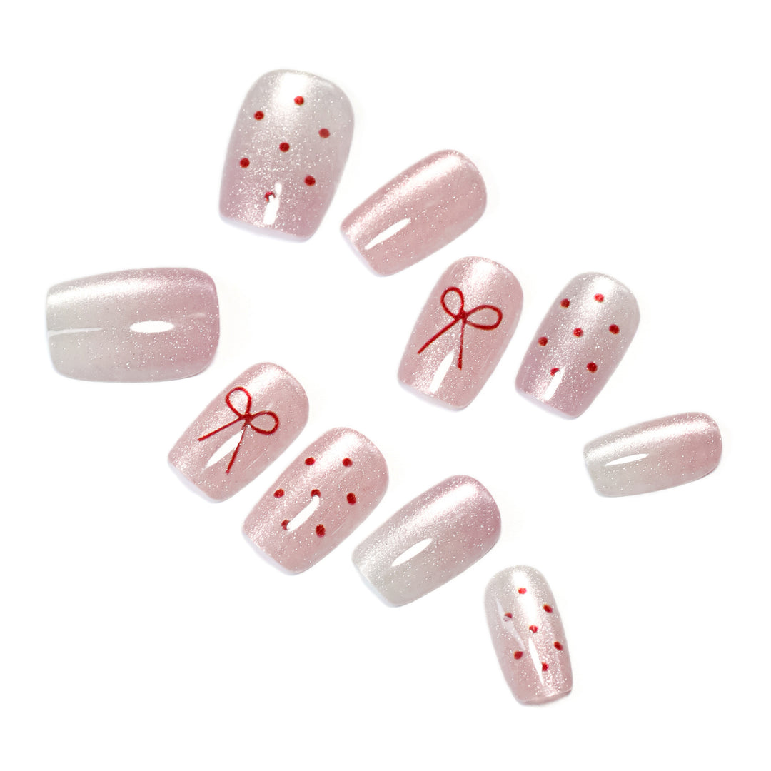 Artificial nail art with cute bow design Kalsten
