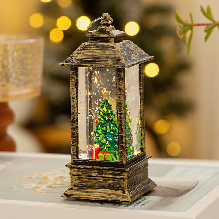 Christmas lantern with LED lighting and decorative snow effect