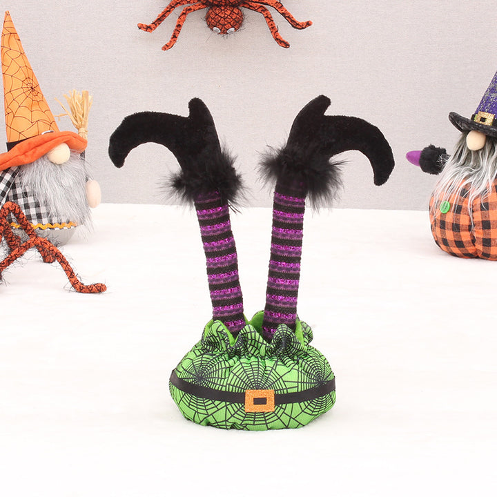 Skurrile Halloween table figure with standing witch legs and spider web sack