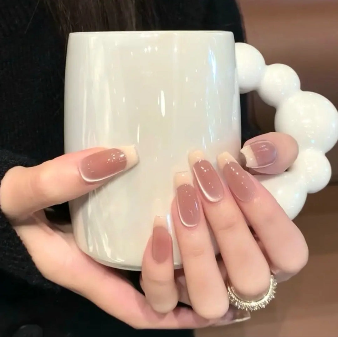 Artificial nails with sweet animal motifs and elegant French tip design Kalsten