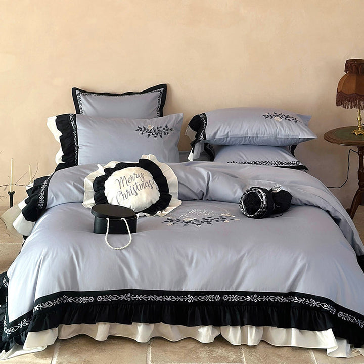 Elegant bed linen set made of cotton satin with embroidery, contrasting frill and round cushion