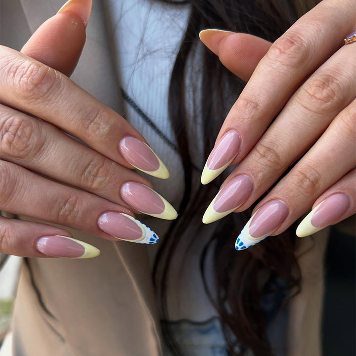 Artistic Stiletto Nail Design with Gradient Tips