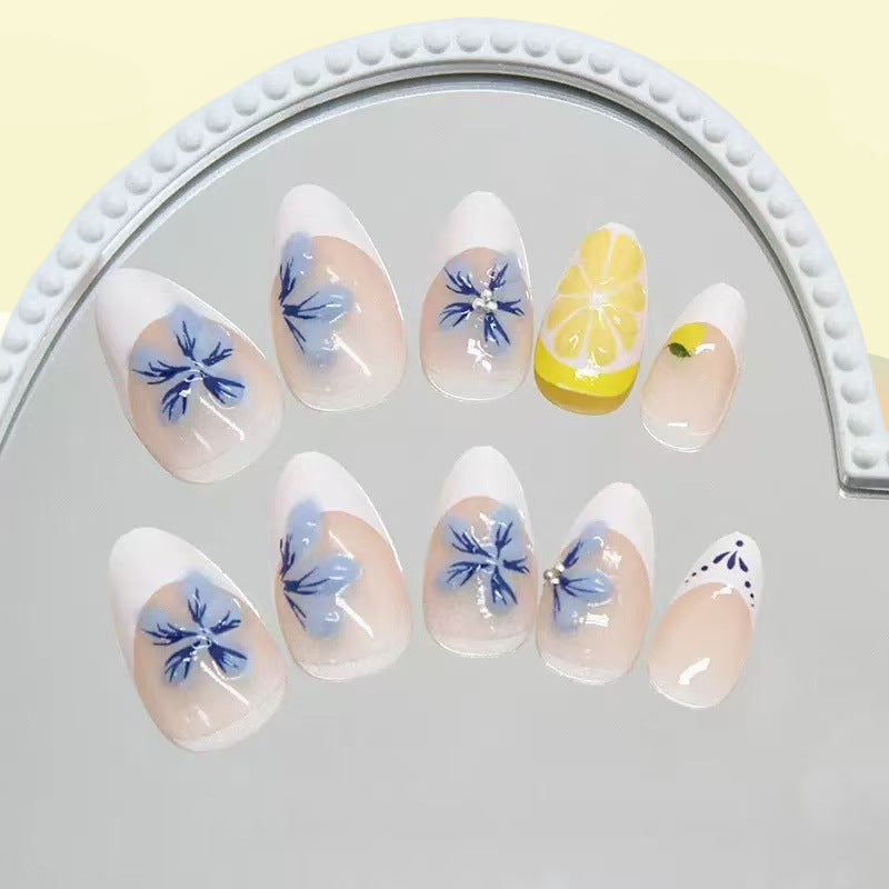Artistic artificial nails with floral and fruity accents Kalsten