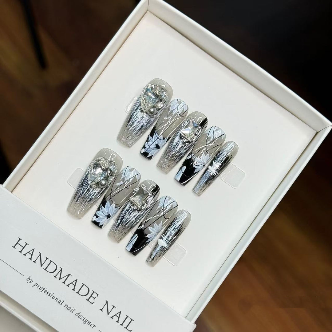 Artistic Handcrafted Press-On Nail Set with Floral and Gem Accents