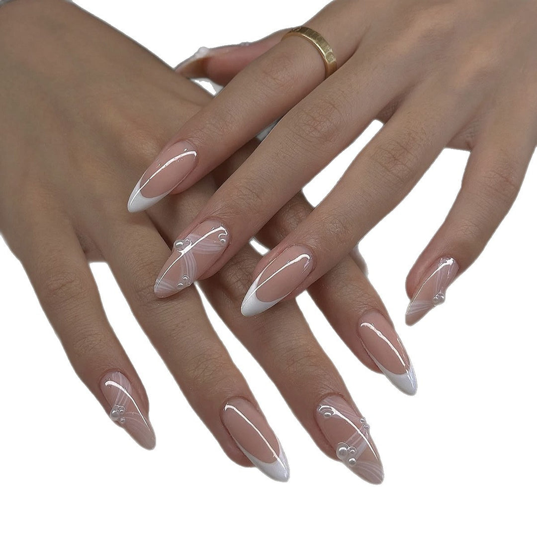 Creative acrylic nail set with elegant tips and glitter decorations Kalsten