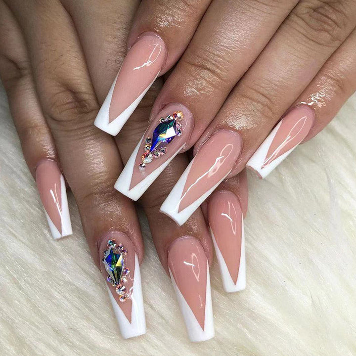 Artificial nails with elegant tips and rhinestone detail Kalsten