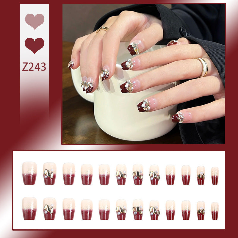 Acrylic nail set with elegant glitter and flower accents Kalsten