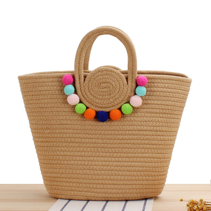 Fashionable handbag with playful pompom decoration Kalsten